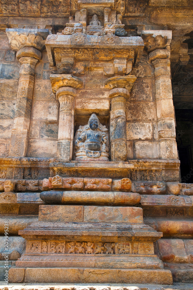 Padmanidhi in the niche of the left side of Maha-mandapa, Airavatesvara Temple, Darasuram, Tamil Nadu. View from East. Padmanidhi in the niche of the left side of Maha-mandapa, Airavatesvara Temple, Darasuram, Tamil Nadu. View from East.