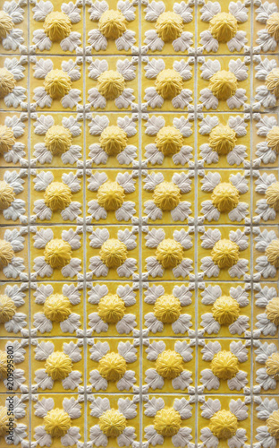 Traditional Portuguese azulejo tiles on the building in Porto, Portugal.