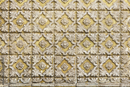 Traditional Portuguese azulejo tiles on the building in Porto, Portugal.