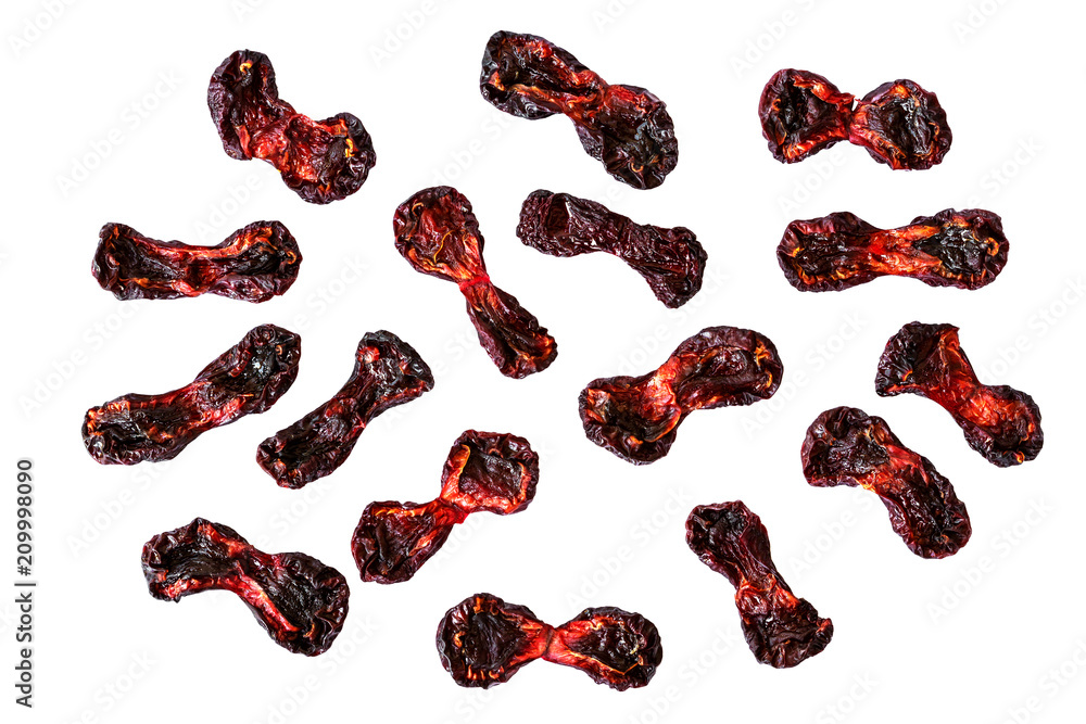 A group of pieces of dried cherry isolated on white background without shadows A group of pieces of dried cherry isolated on white background without shadows
