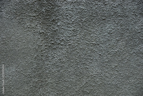 gray stone texture from a part of a concrete wall of a building