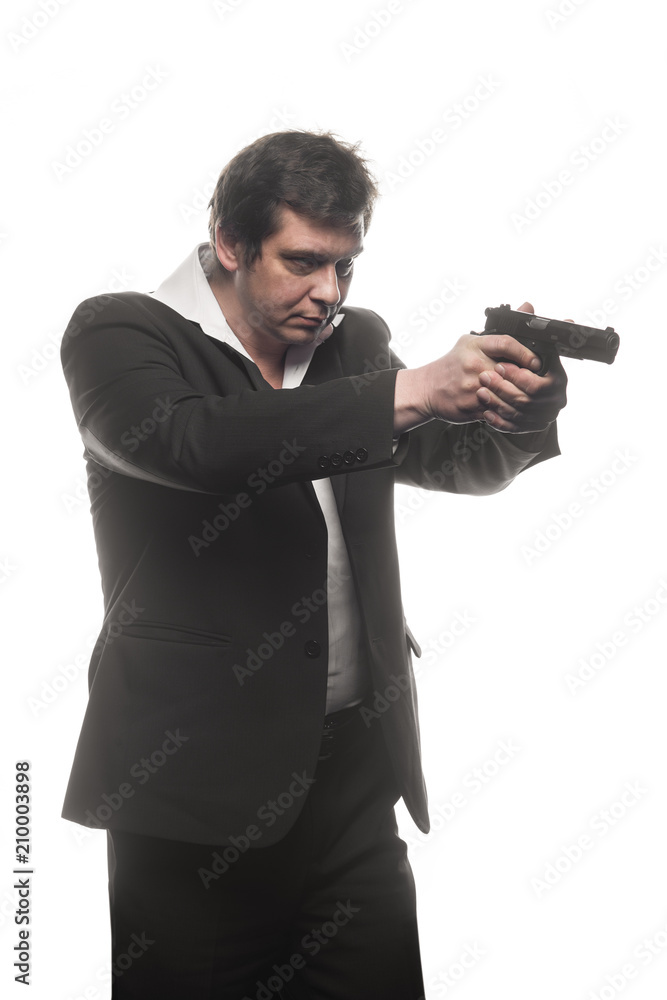 Handsome middle aged detective man with gun Handsome middle aged detective man with gun