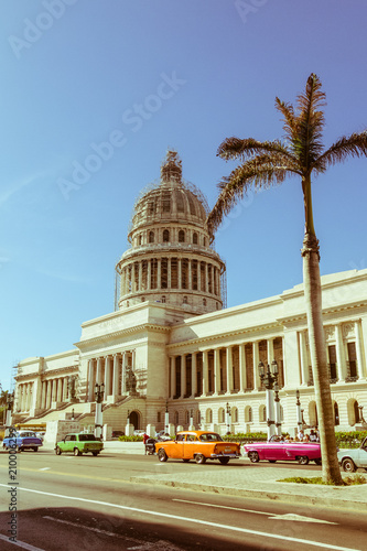 A vintage car circulating in front of the Capitol in Havana, Cuba. photo