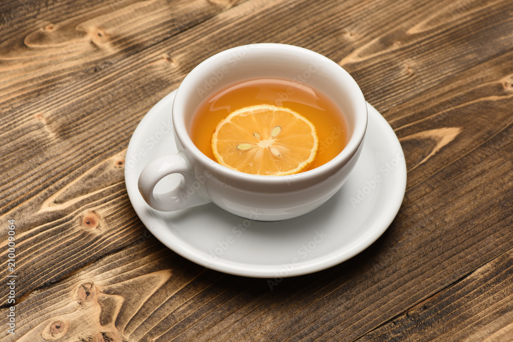 Hot beverage with sugar cubes on wooden background. Hot beverage with sugar cubes on wooden background.