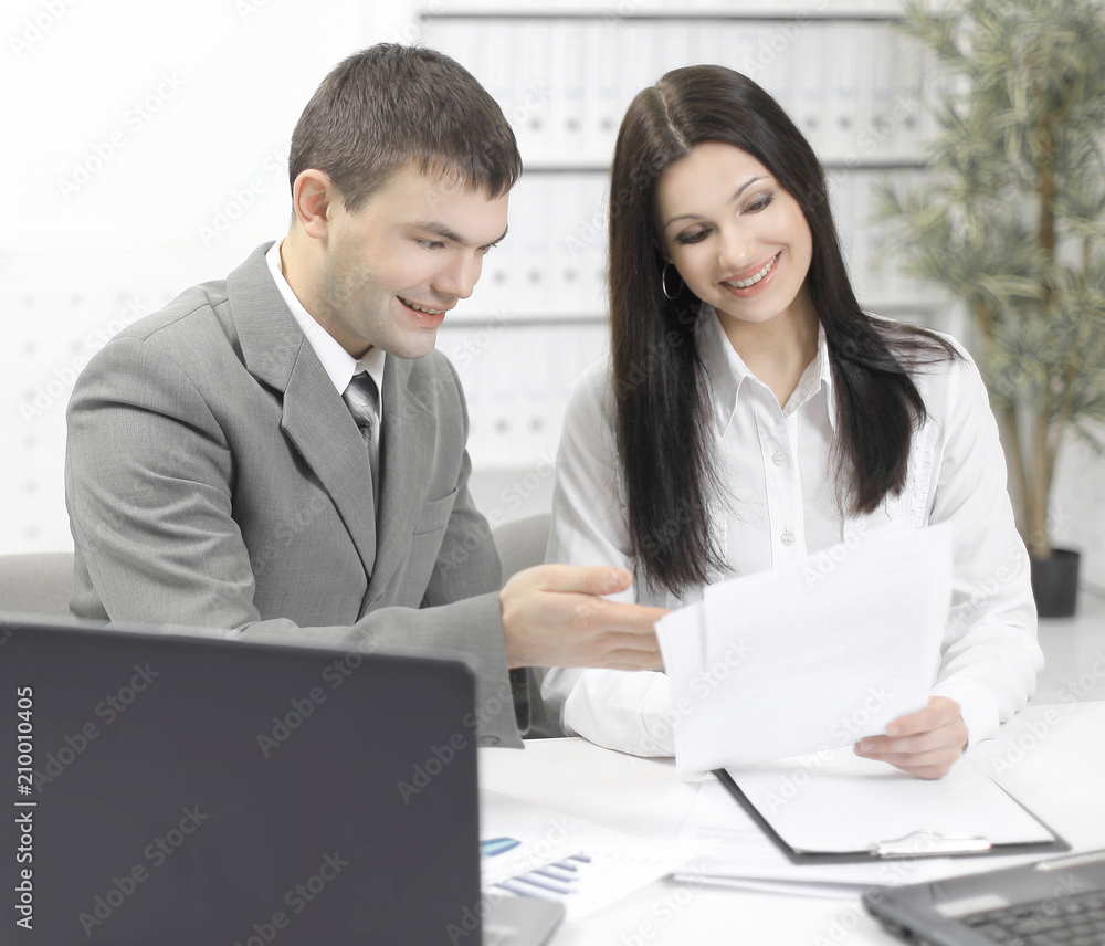 employees working with financial documents in the office employees working with financial documents in the office
