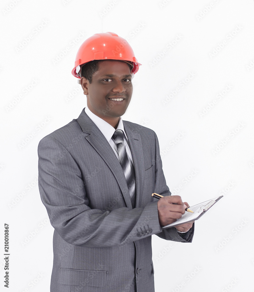 handsome engineer architect signing a contract.isolated on white handsome engineer architect signing a contract.isolated on white