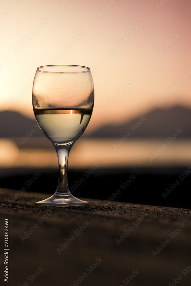white wine on the sky background with clouds