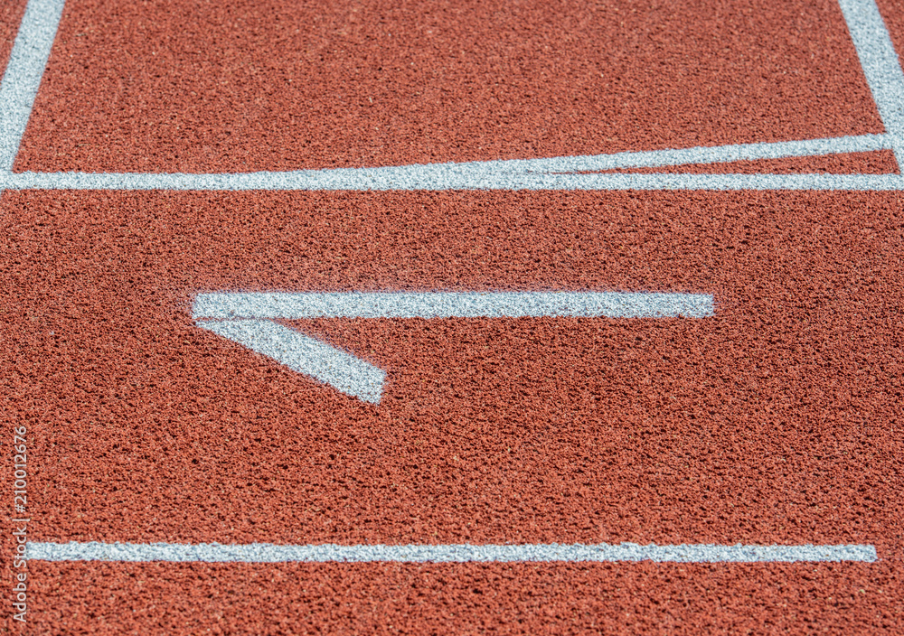 Laufbahnmarkierung auf einer Leichtathletikbahn Laufbahnmarkierung auf einer Leichtathletikbahn