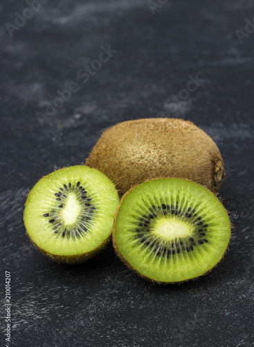 fresh, ripe kiwi on a black background