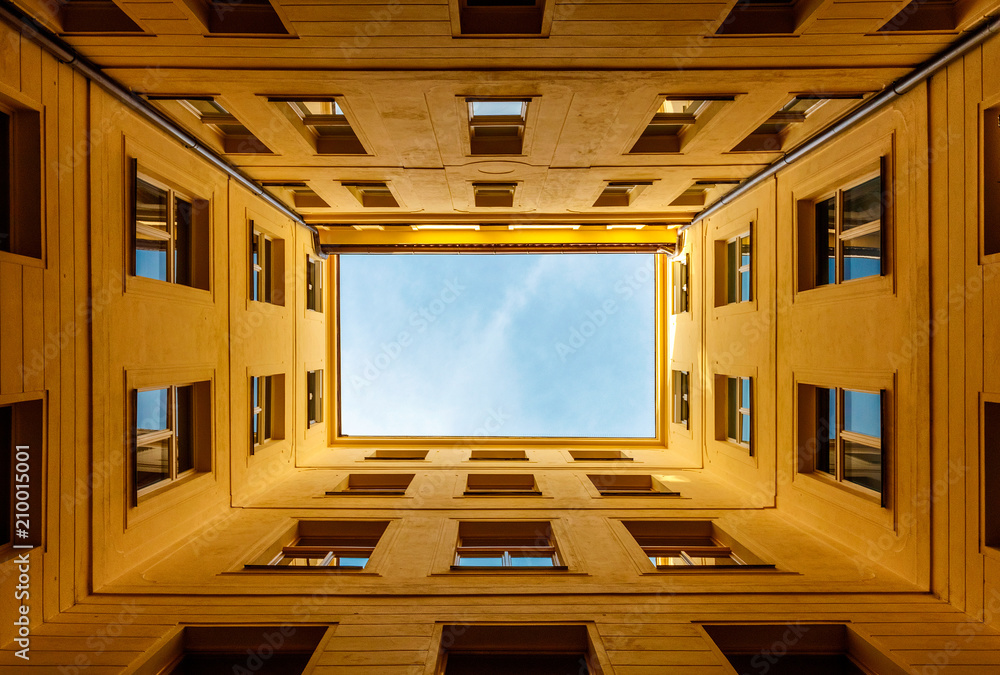 Architectural detail of an open courtyard in an old building in Prague, Czech Republic