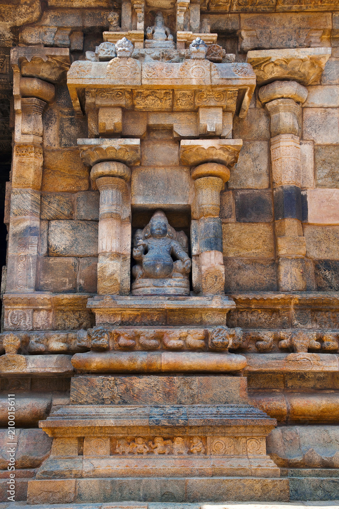Sankhanidhi in the niche of the right side of Maha-mandapa, Airavatesvara Temple, Darasuram, Tamil Nadu. View from East.