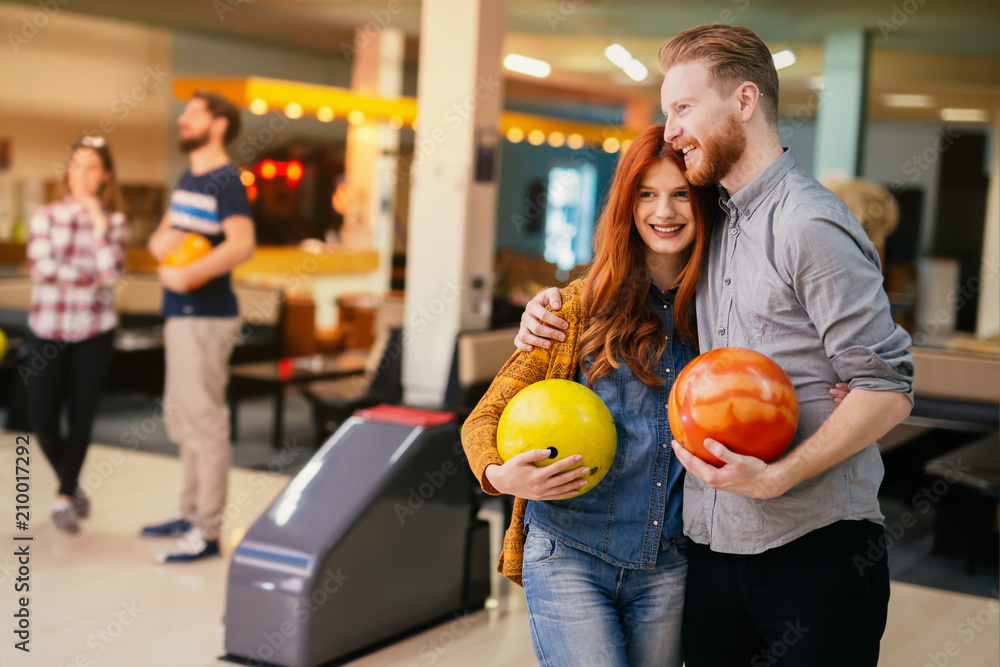 Fototapeta premium Beautiful couple dating and bowling