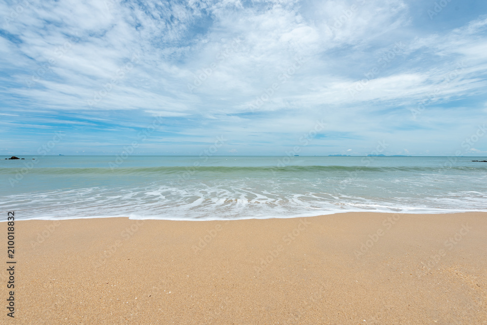 Soft waves on the sand beach