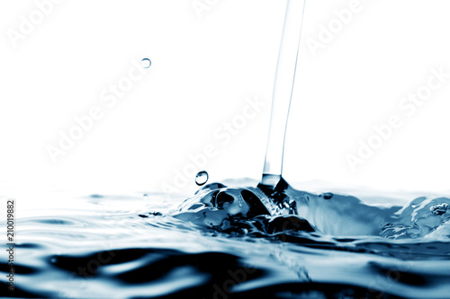 Water droplet as background / Water is a transparent, tasteless, odorless, and nearly colorless chemical substance that is the main constituent of Earth's streams, lakes, and oceans