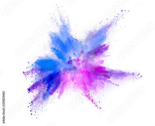 Explosion of coloured powder on white background