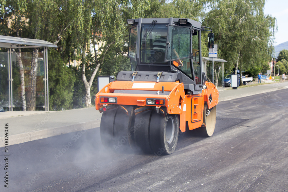Roller, construction equipment, on the road repair site Roller, construction equipment, on the road repair site