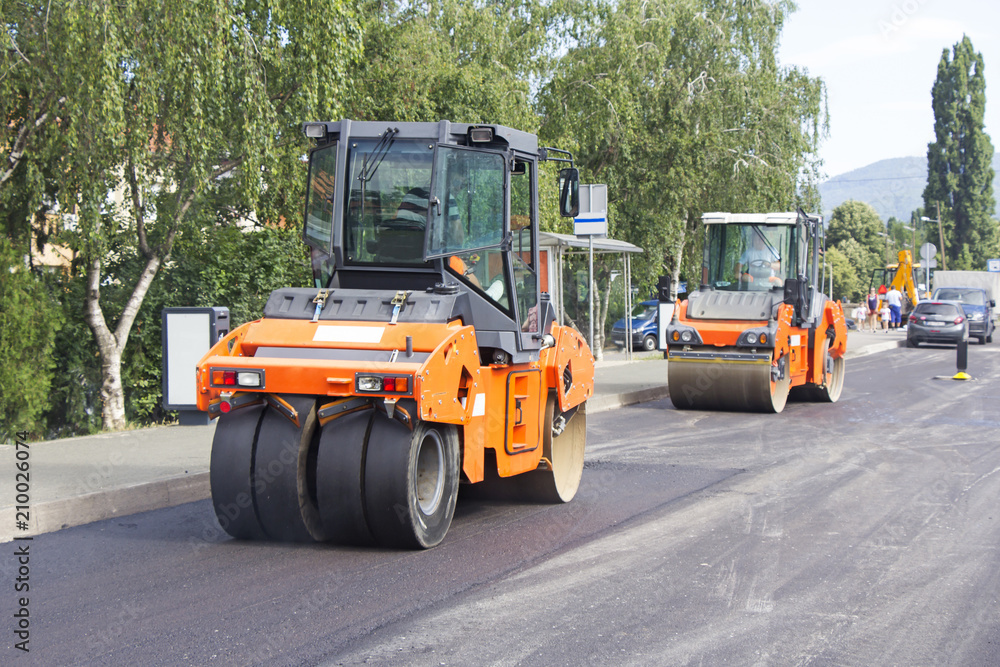 Roller, construction equipment, on the road repair site Roller, construction equipment, on the road repair site