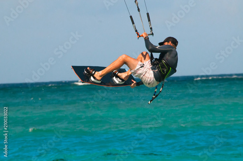 Man Kitesurfing Trick
