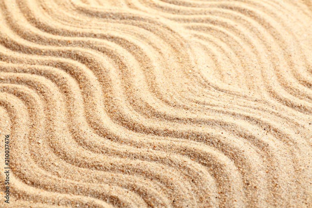 Naklejka premium Sand with pattern, closeup