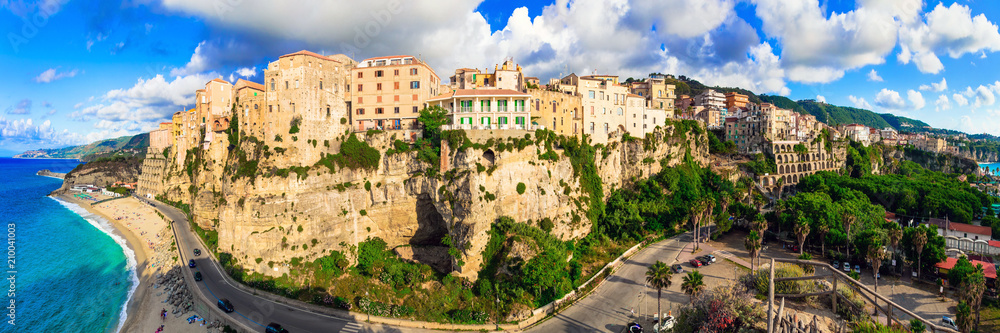 Italian summer holidays - beautiful Tropea town on the rock and great beach. Calabria, Italy
