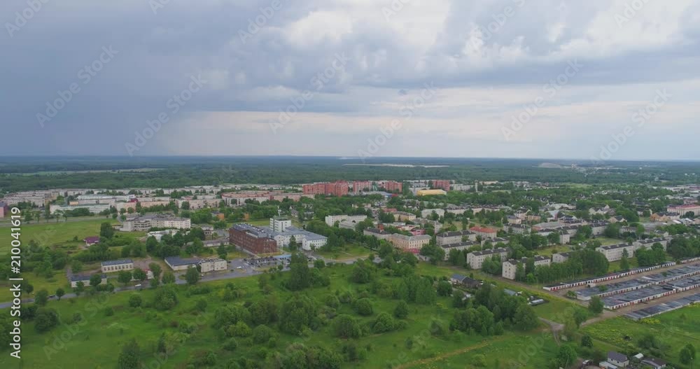 Aerial perspective of stormy weather over the city. Massive clouds, looks epic. Aerial perspective of stormy weather over the city. Massive clouds, looks epic.