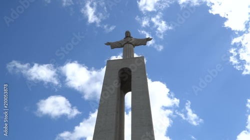 The Cristo Rei monument of Jesus Christ in Lisbon, Portugal photo