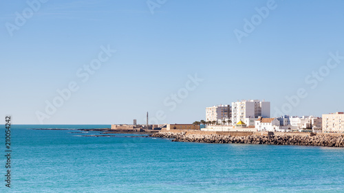 Cadiz Waterfront. A view of the Cadiz waterfront in Spain with the Castillo de San Sebastian in the background.