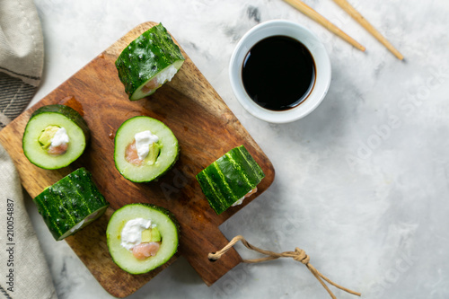 Photography Low carb sushi alternative - cucumber sushi with salmon and avocado