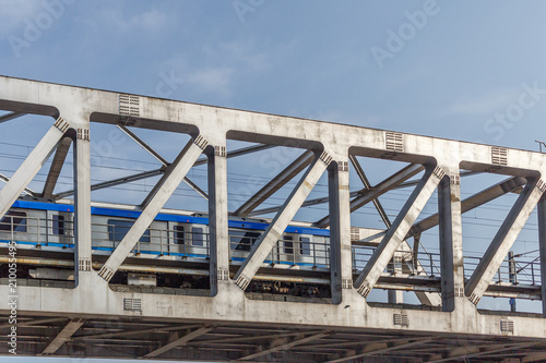 Unidentified metro train iron bridge with zigzag lines built using modern day technology in India.Seen with moving metro train. © karthikeyan