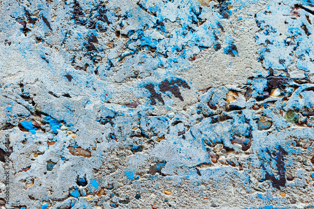 old concrete grunge background cement wall paint stones blue texture pebbles colored gray yellow