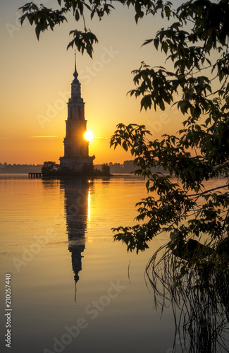 Flooded bell tower of St. Nicholas Cathedral in Kalyazin Kalyazin at sunrise  Tver region  Russia