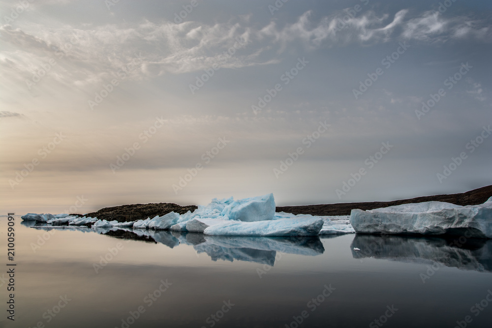 North shore in Canada. Ice and mirror sea. North shore in Canada. Ice and mirror sea.