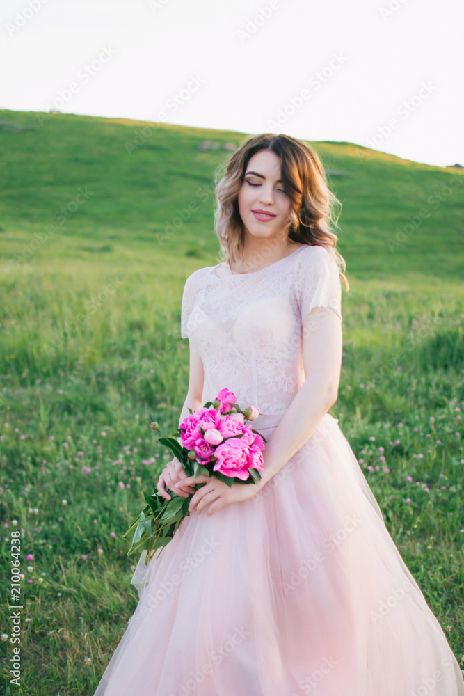 Happy bride in a pink dress Happy bride in a pink dress