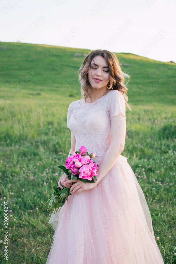 Happy bride in a pink dress Happy bride in a pink dress