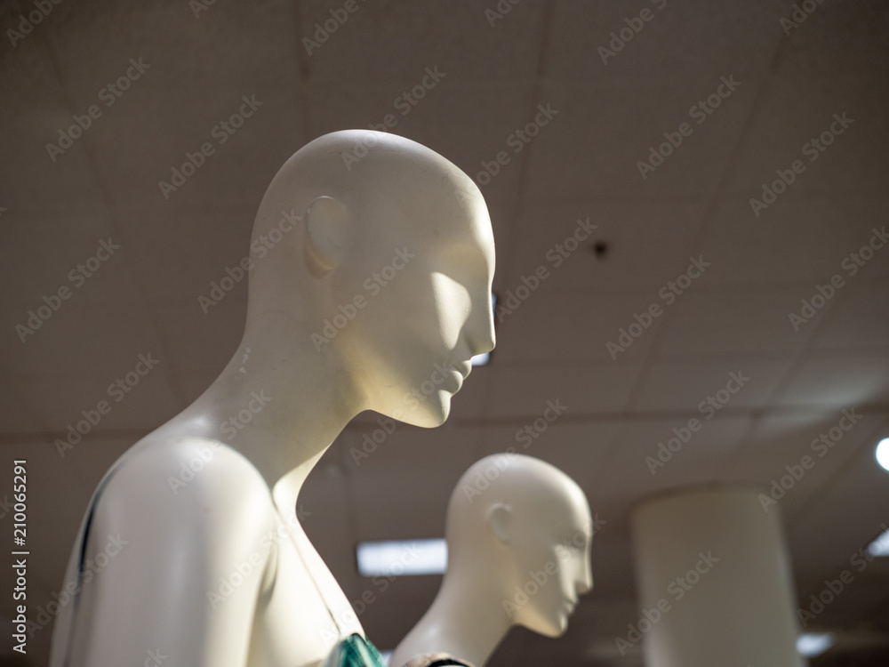 Female mannequins wearing tank tops on display in a department store Female mannequins wearing tank tops on display in a department store