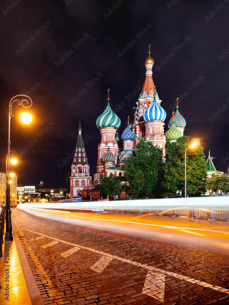 Fototapeta premium Night view on illuminated famous Saint Basil Cathedral on Red Square. Long exposure. Moscow, Russia.