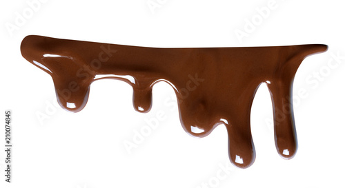 Melting chocolate drips. Chocolate isolated on white background.