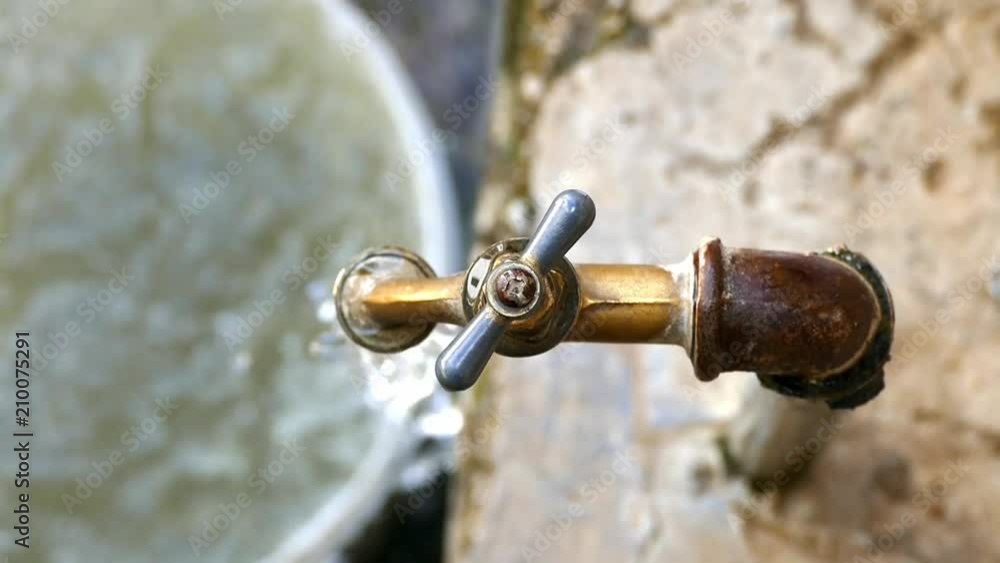 water flows from the faucet, steep shooting,
water flows from the faucet, steep shooting,
