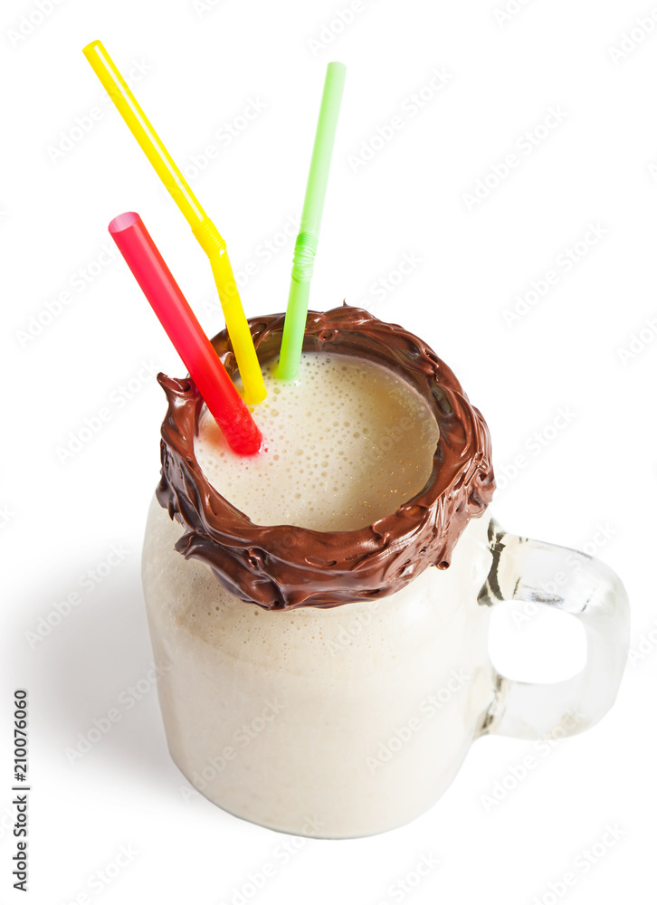 Banana milkshake in a glass jar (mason jar), isolated on white background. Banana milkshake in a glass jar (mason jar), isolated on white background.