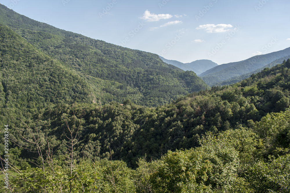 A view from Asen's fortress. Asenova fortress or Petrich, are ruins of a medieval fortress with the fortified church of the Virgin Mary. It is located in the Rhodope Mountains.