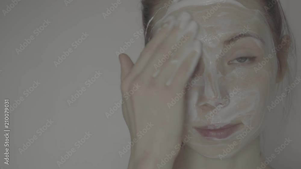 Skin Care. Portrait Of Beautiful Healthy Woman Putting Moisturizing Cream Skin Care. Portrait Of Beautiful Healthy Woman Putting Moisturizing Cream