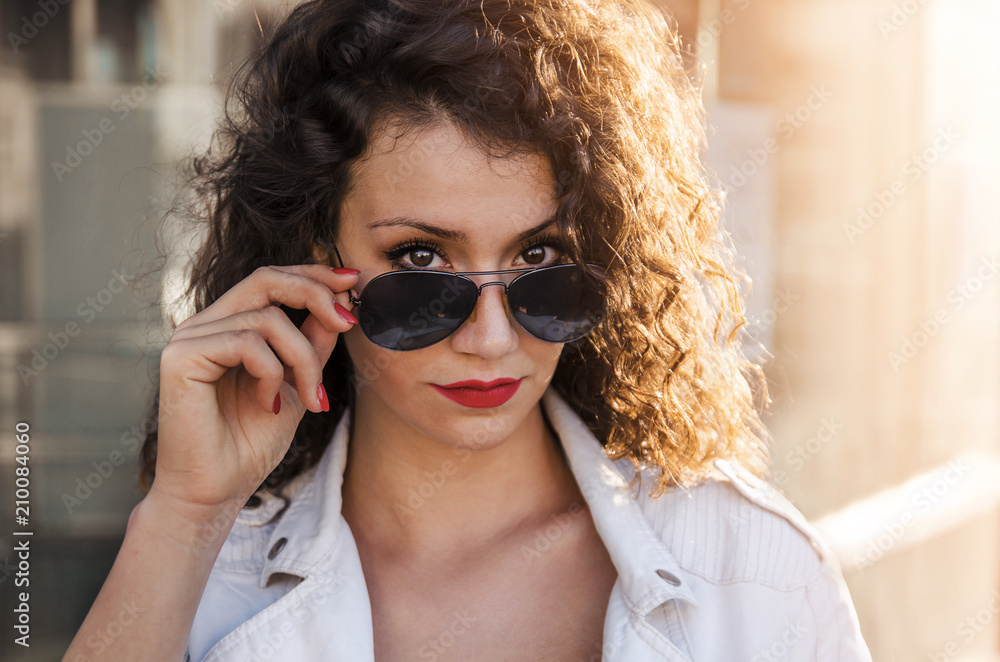 Gorgeous girl with sunglasses closeup portrait, girl looking at camera
