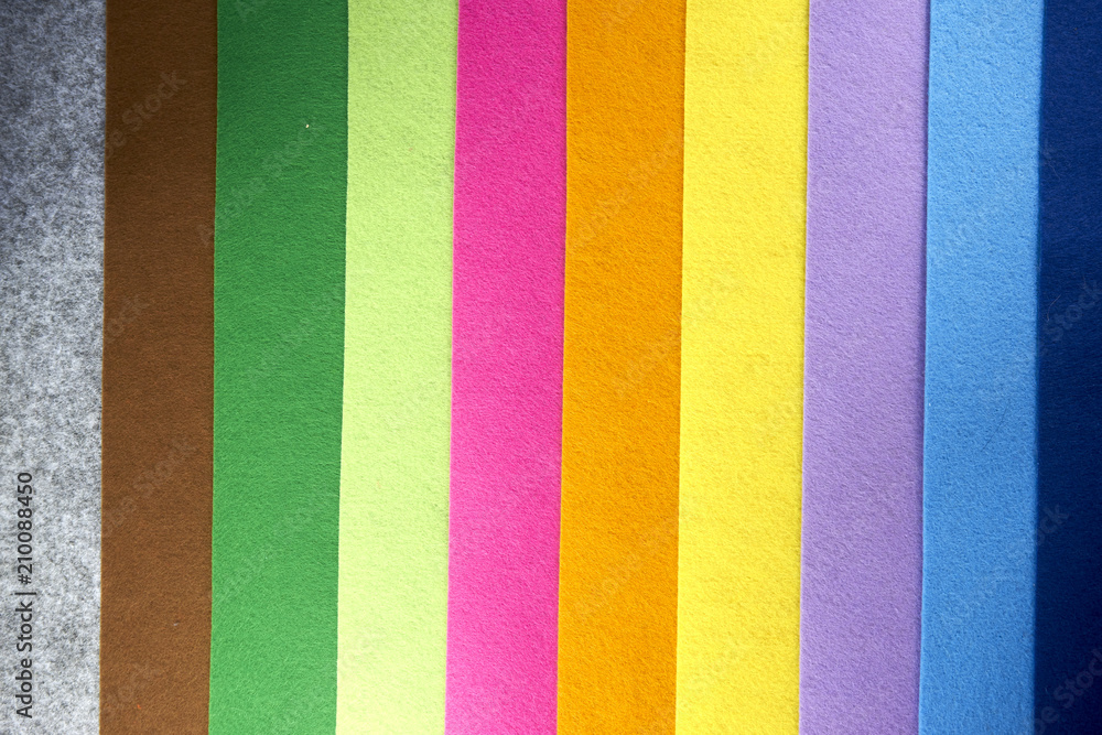 Colored felt texture background, grey, brrown, green, lime, pink, orange, yellow, purple, light blue, dark plue Colored felt texture background, grey, brrown, green, lime, pink, orange, yellow, purple, light blue, dark plue