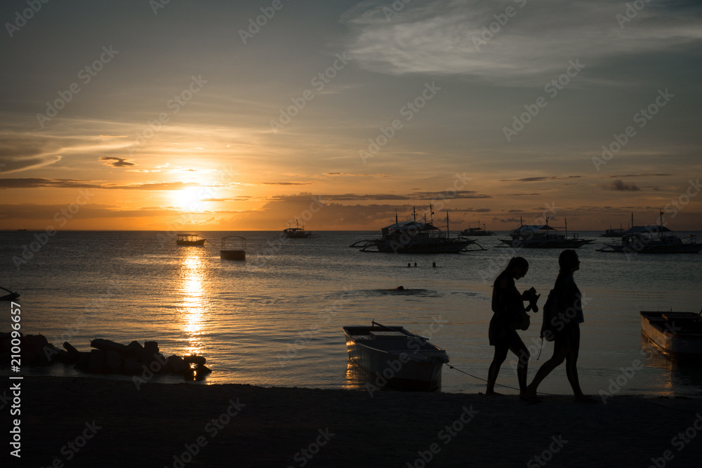 Tourist Friends Walking With an Island Beach Sunrise
