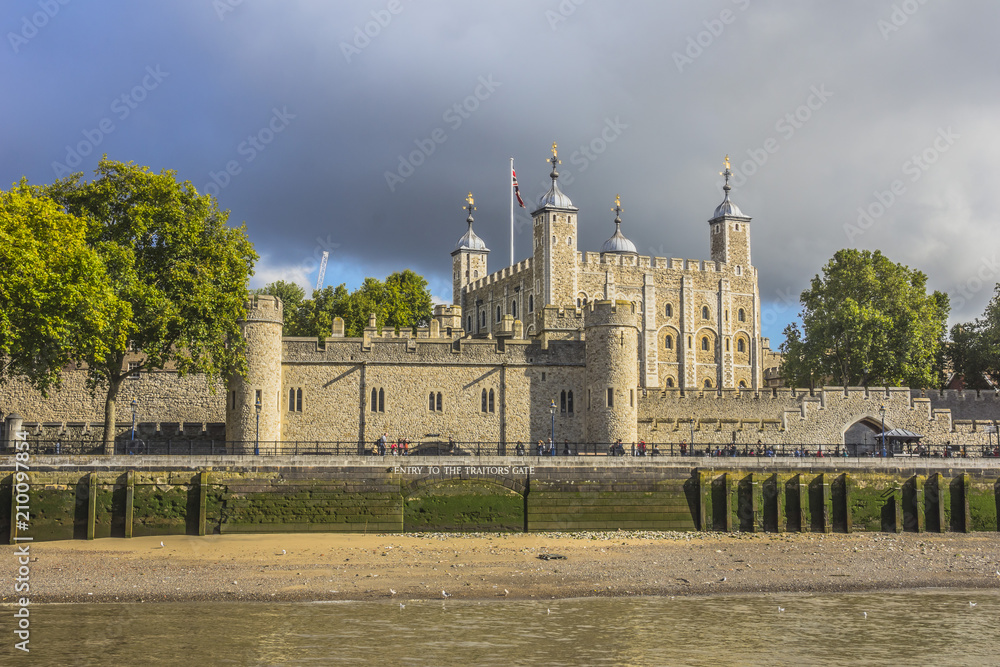 View of the Tower of London from the Thames river. London England