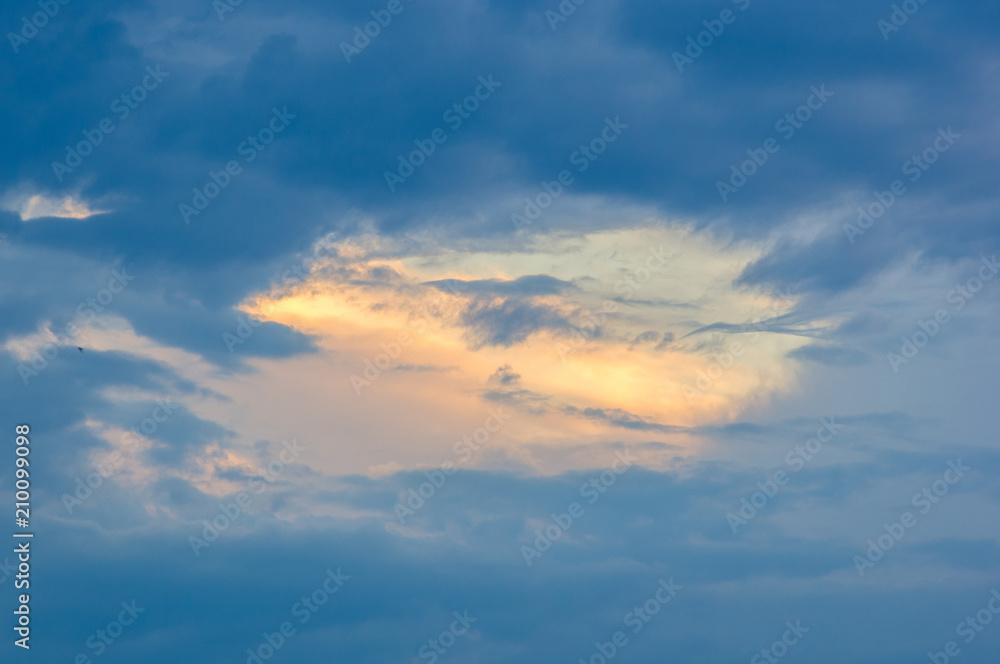 Landscape with dramatic light - beautiful golden sunset with saturated sky and clouds. Landscape with dramatic light - beautiful golden sunset with saturated sky and clouds.