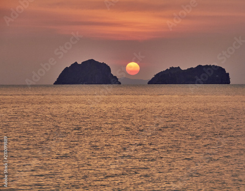 Sea lagoon on a colourful sunset background  