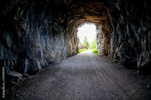 Fototapeta Naklejka Na Ścianę i Meble -  Light at the end of the Tunnel at Myra Canyon in Kelowna, BC, Canada