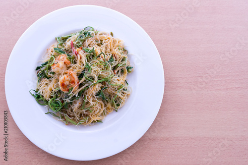 Thin rice noodles stir fried with shrimp and water minosa photo