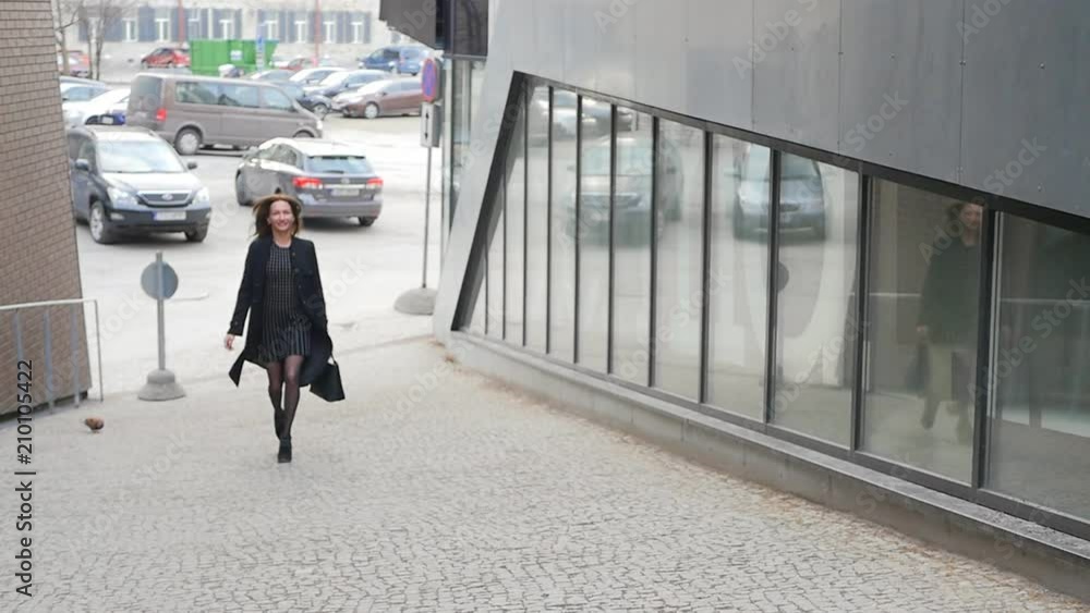 Young woman walking on the street Young woman walking on the street